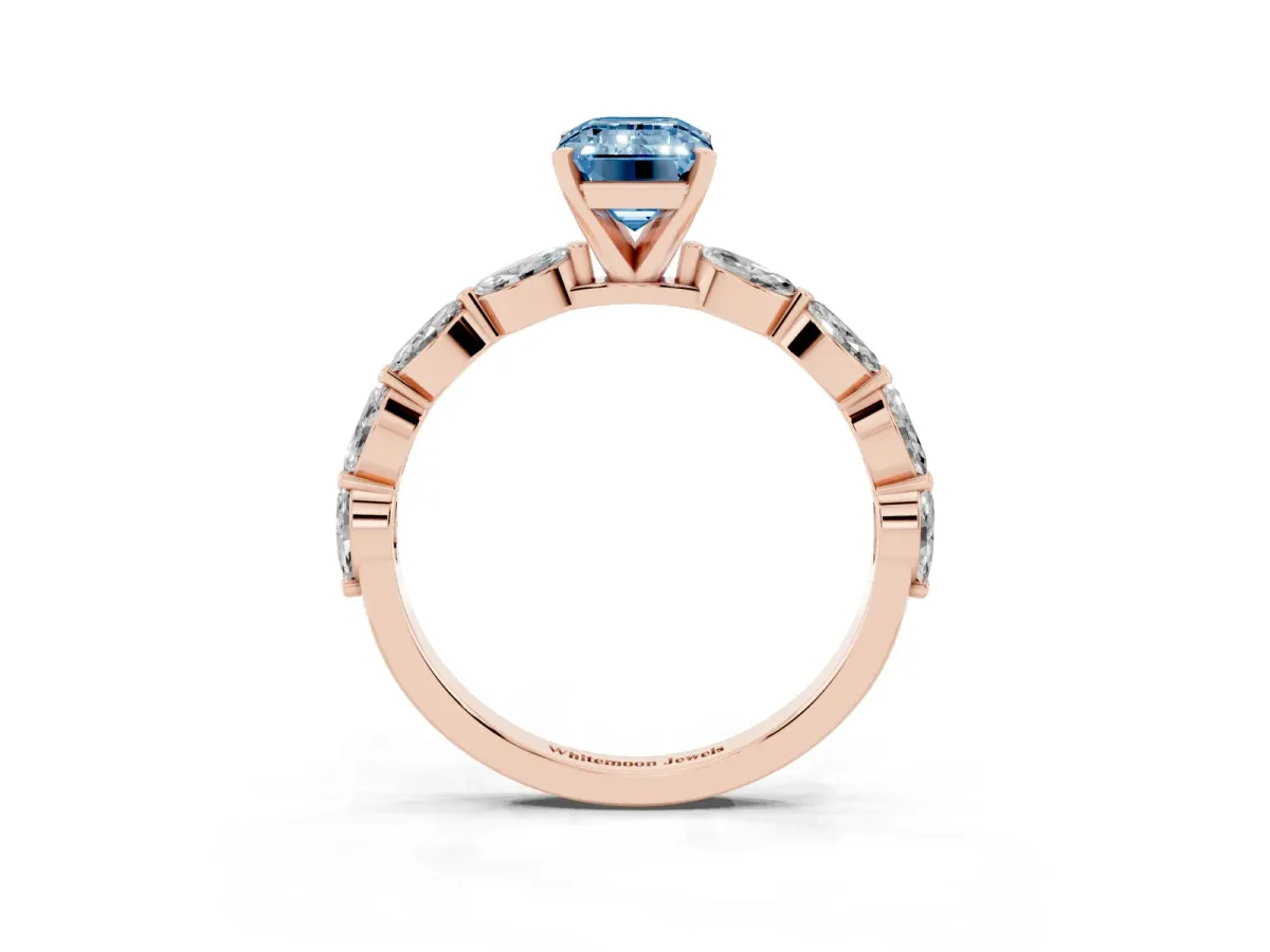 Fancy Blue Emerald Cut Diamond Ring with Marquise Side Stones and Prong Setting Rose gold
