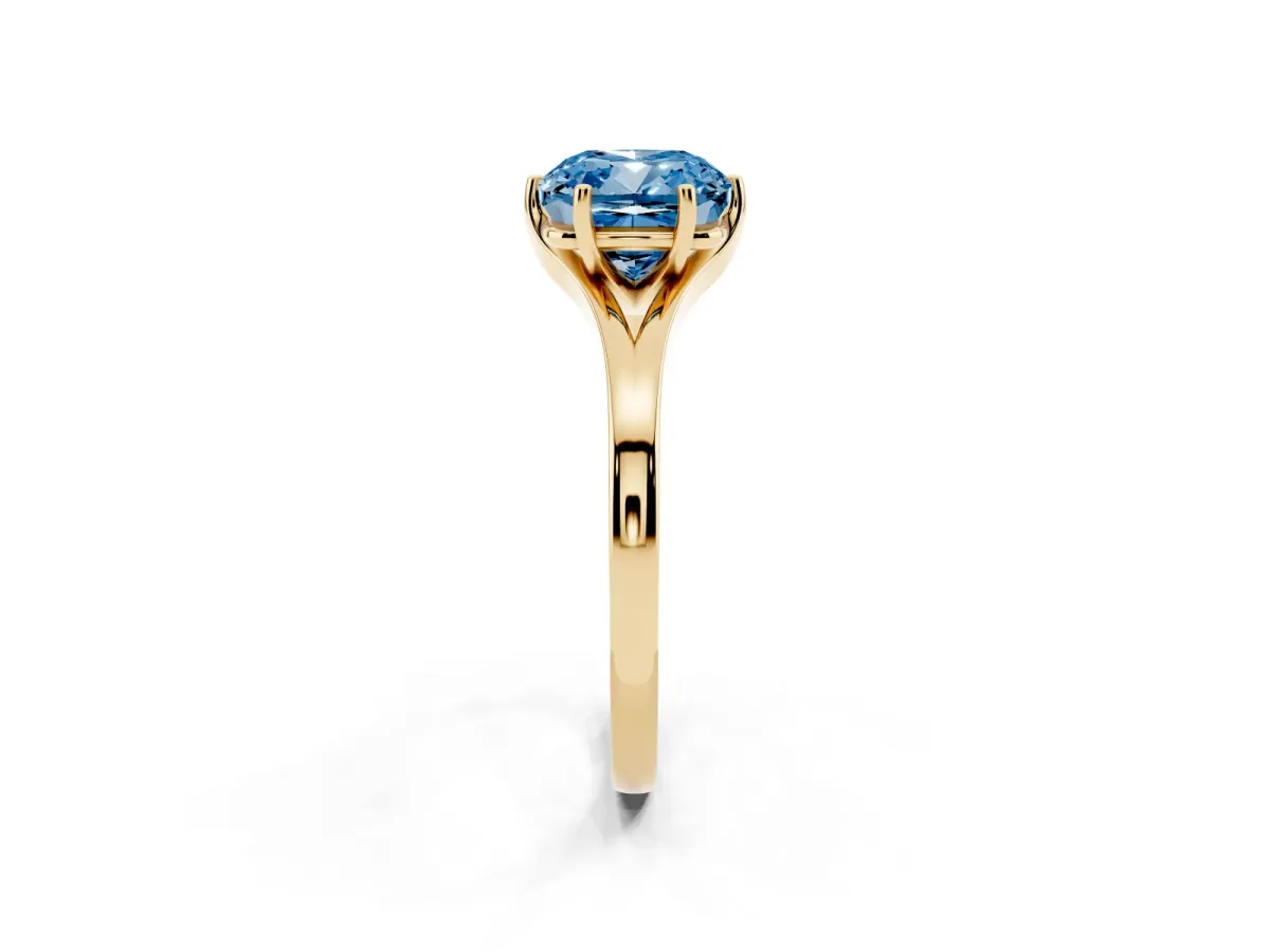 Fancy Blue Cushion Cut Solitaire Diamond Ring with Six-Prong Setting and Tapered Band Yellow gold