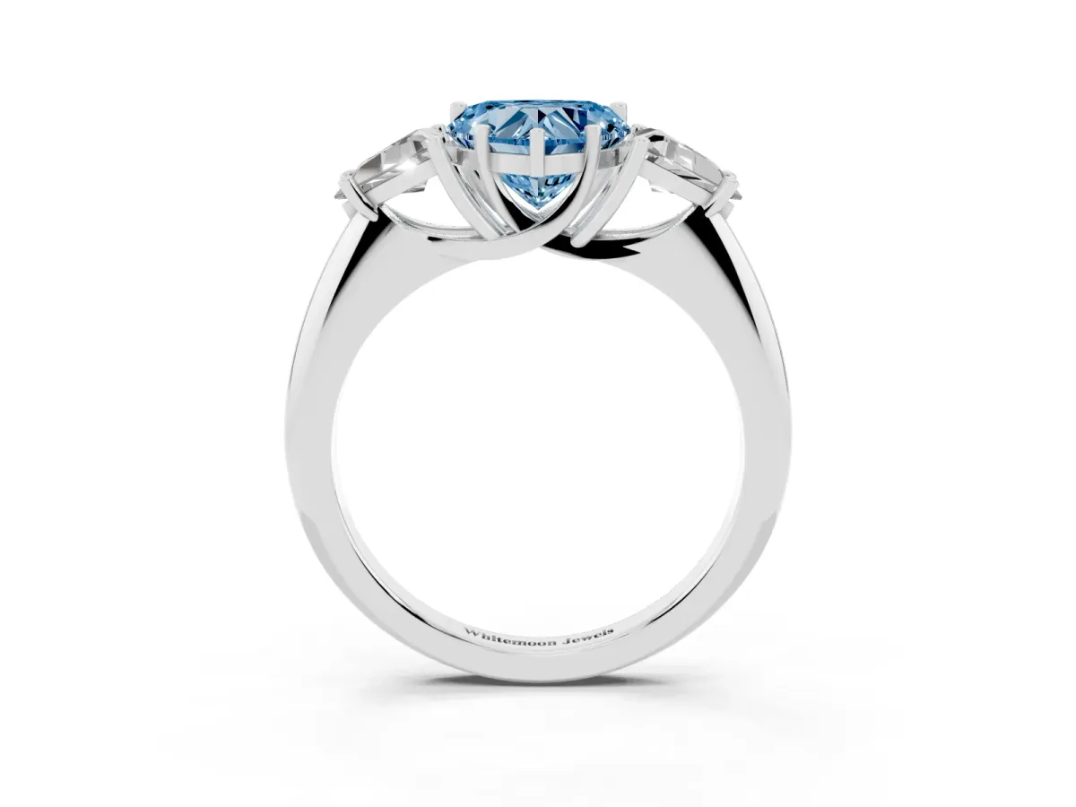 Fancy Blue Three-Stone Heart Cut Diamond Engagement Ring with Trillion Side Stones and Prong Setting Silver