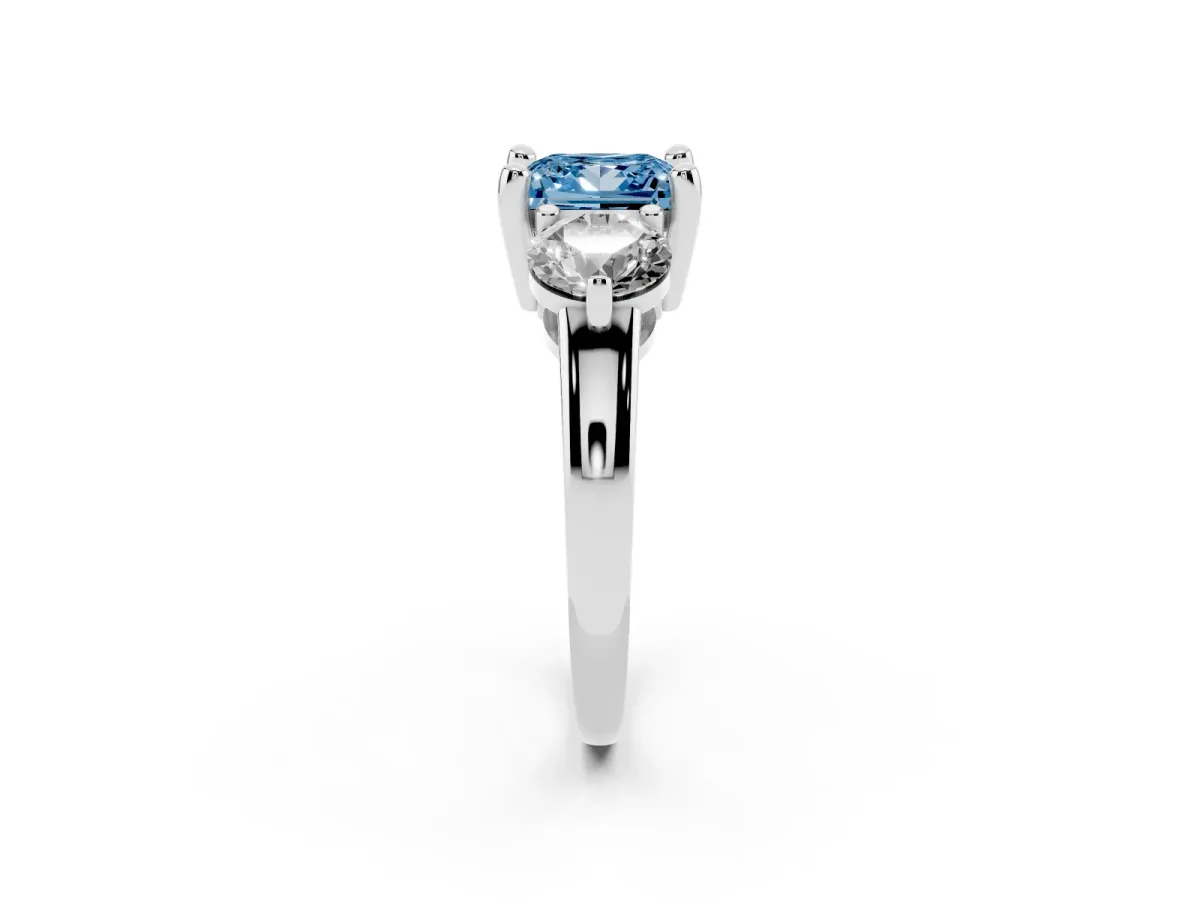Fancy Blue Three-Stone Princess Cut Brilliant Cut Solitaire Ring with Prong Setting on a Classic Band Silver