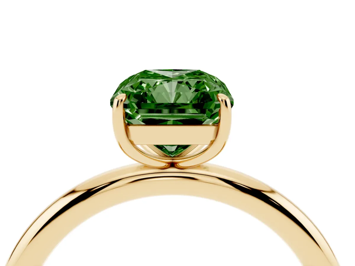 Fancy Green Radiant Cut Solitaire Diamond Ring with Four-Prong Setting on a Plain Band Yellow gold