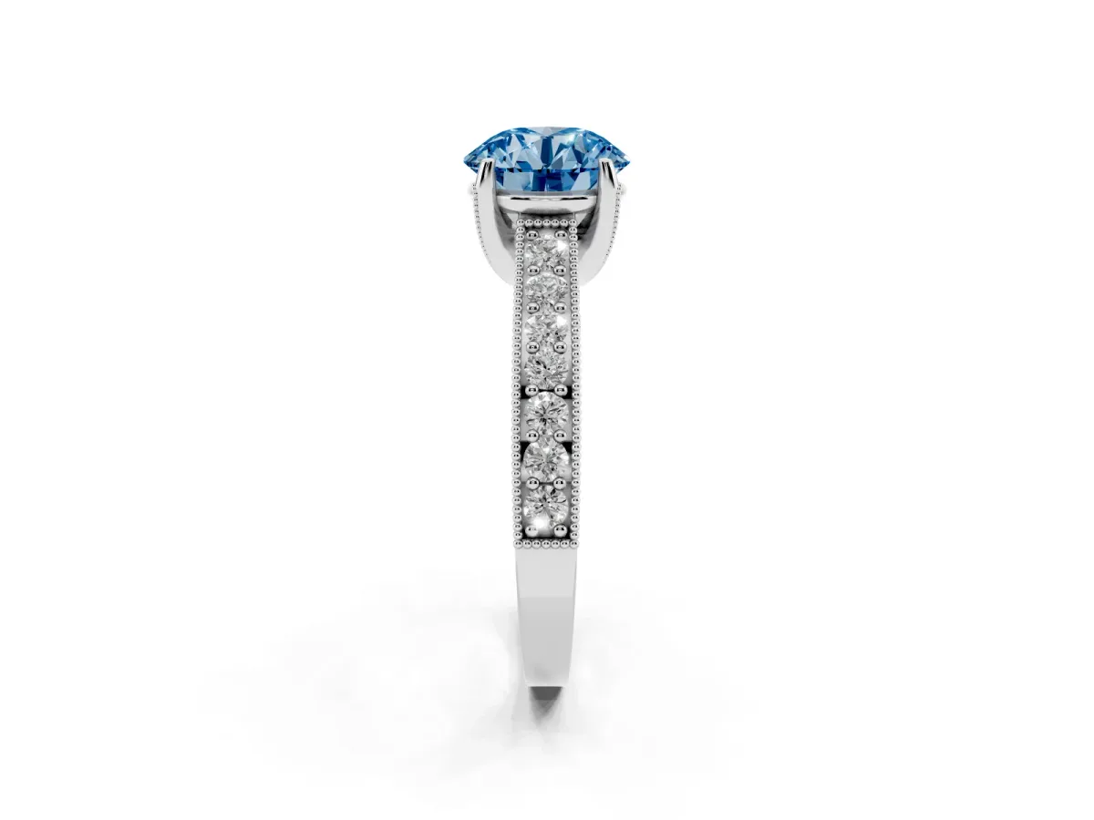 Fancy Blue Round Cut Cut Diamond Solitaire Ring with Milgrain Pave Band and Four Prong Setting Silver