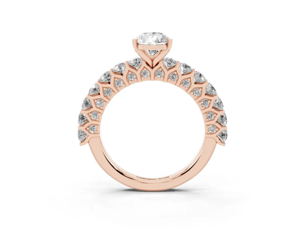 Pear Cut Diamond Solitaire Ring with Shared Prong Pavé Band and Four-Prong Setting Rose gold