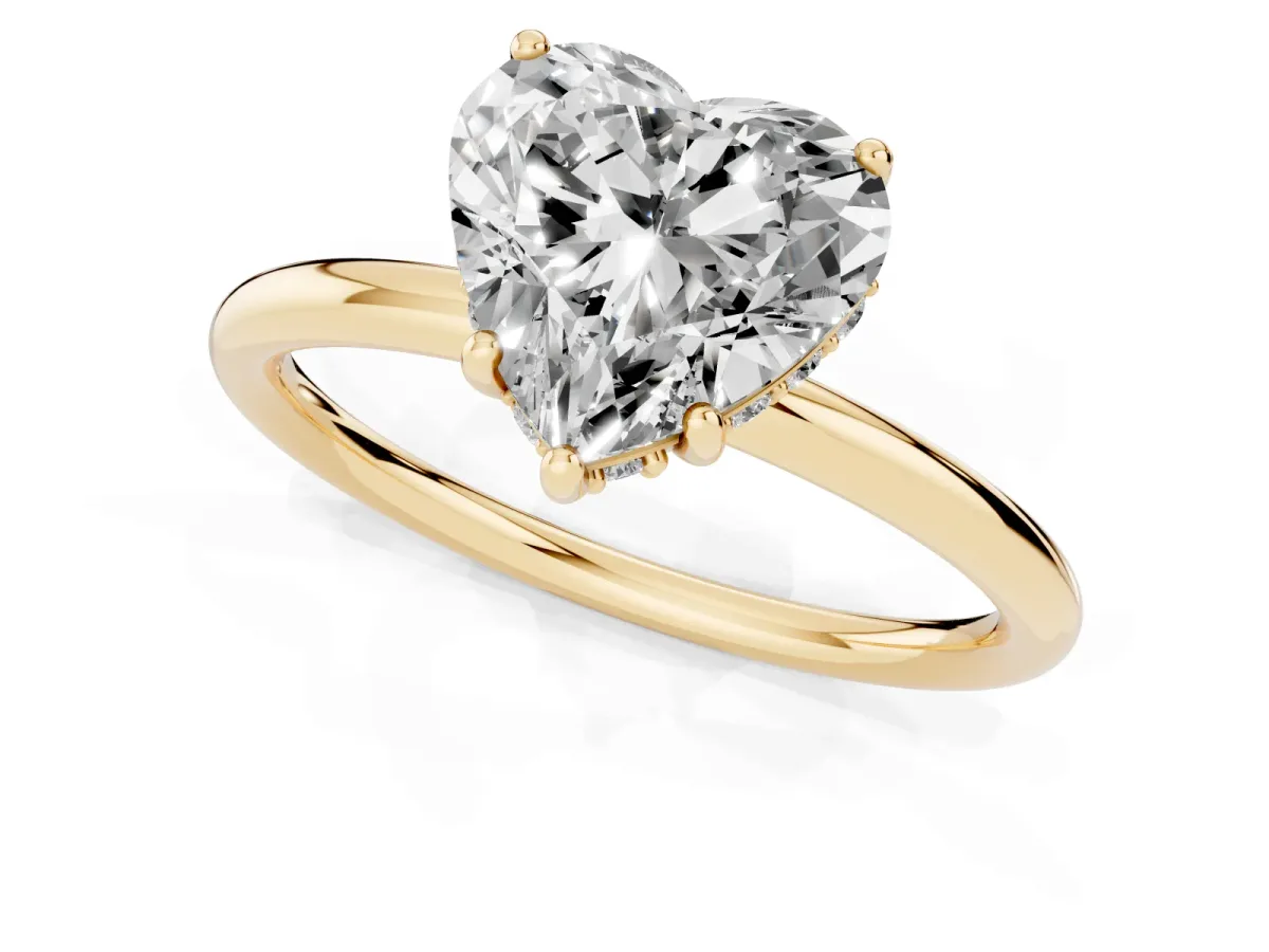 Heart Cut Solitaire Diamond Ring with a Classic Band and Four-Prong Setting Yellow gold