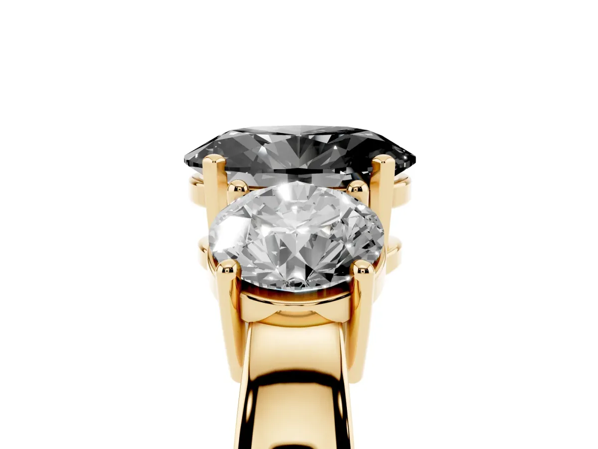 Fancy Black Three-Stone Oval Cut Diamond Ring with Round Side Stones, Classic Band, and Four-Prong Setting Yellow gold