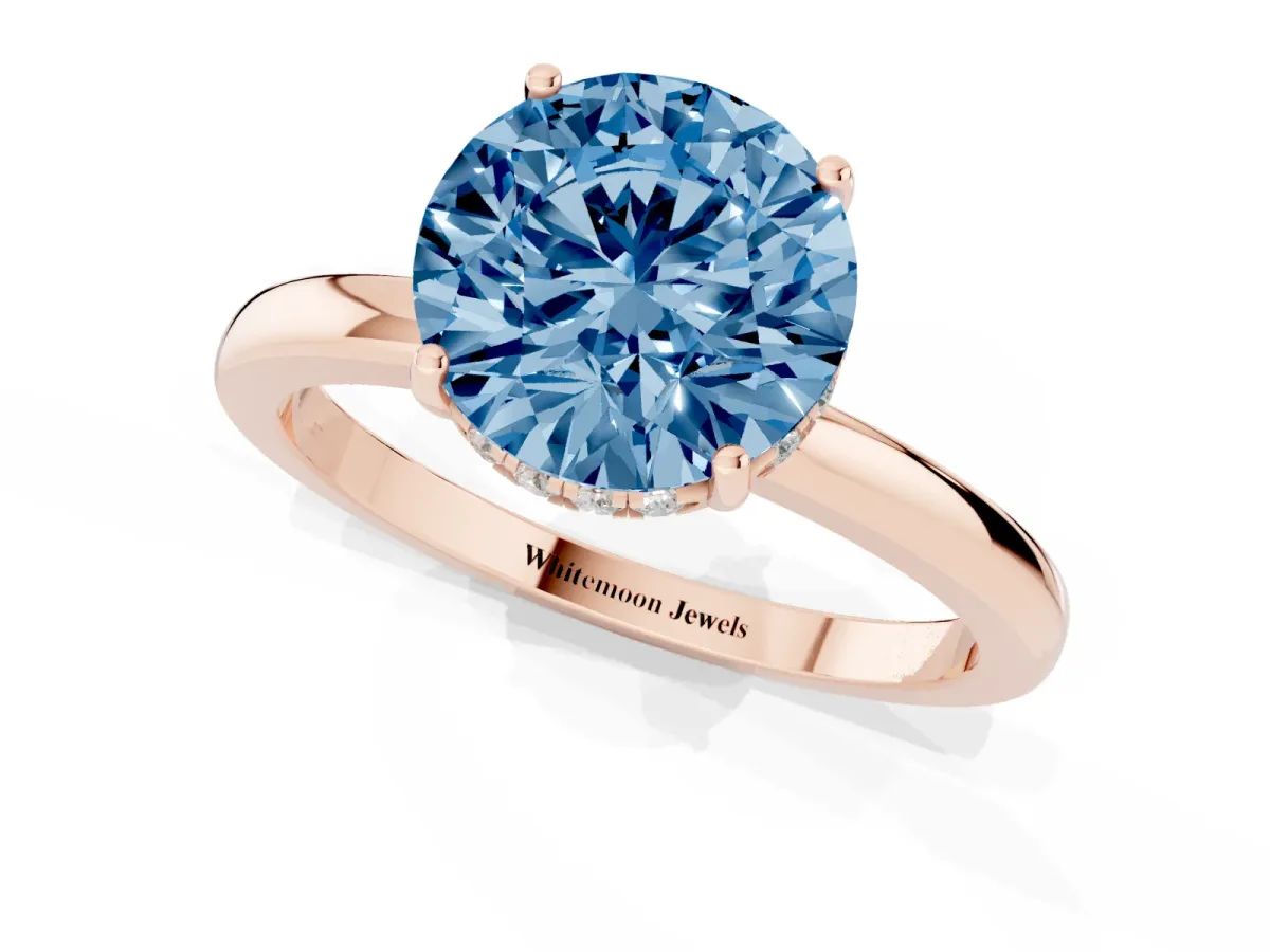 Fancy Blue Round Cut Solitaire Diamond Ring with Prong Setting and Plain Band Rose gold