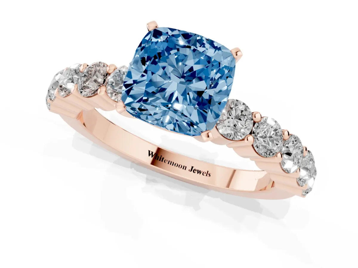 Fancy Blue Cushion Cut Diamond Solitaire Ring with Shared Prong Round Side Stones Rose gold