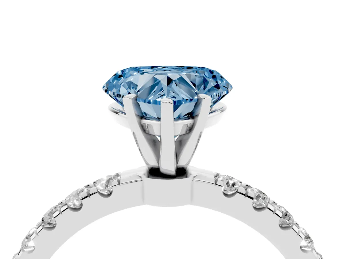 Fancy Blue Heart Cut Diamond Solitaire Ring with Pavé Accents and Four-Prong Setting Silver
