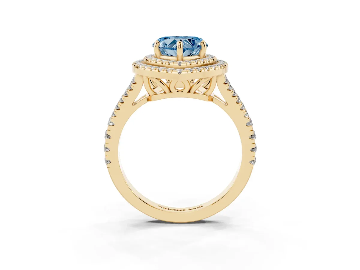 Fancy Blue Heart Cut Diamond Double Halo Ring with Pavé Band and Prong Setting Yellow gold