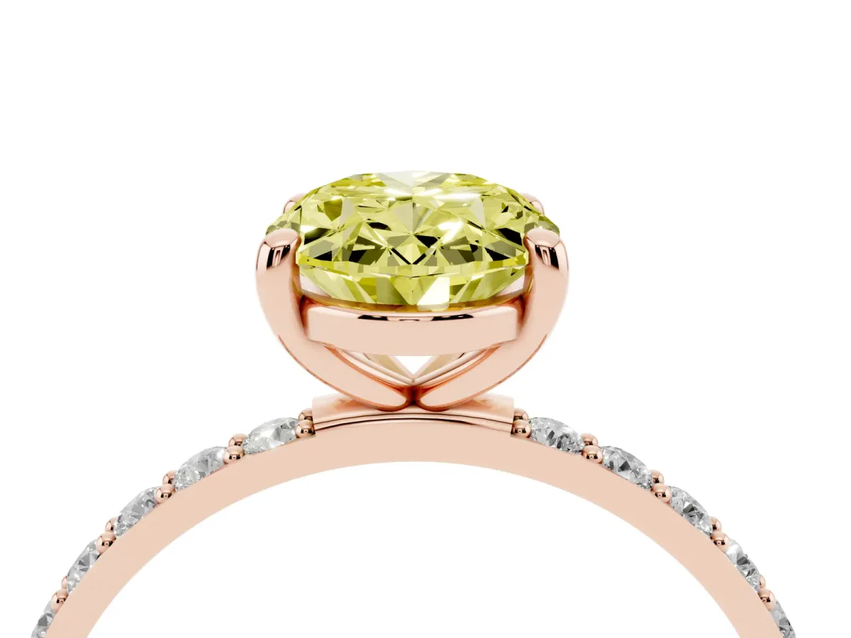 Fancy Yellow Oval Cut Diamond Solitaire Ring with Round Pavé Band and Prong Setting Rose gold