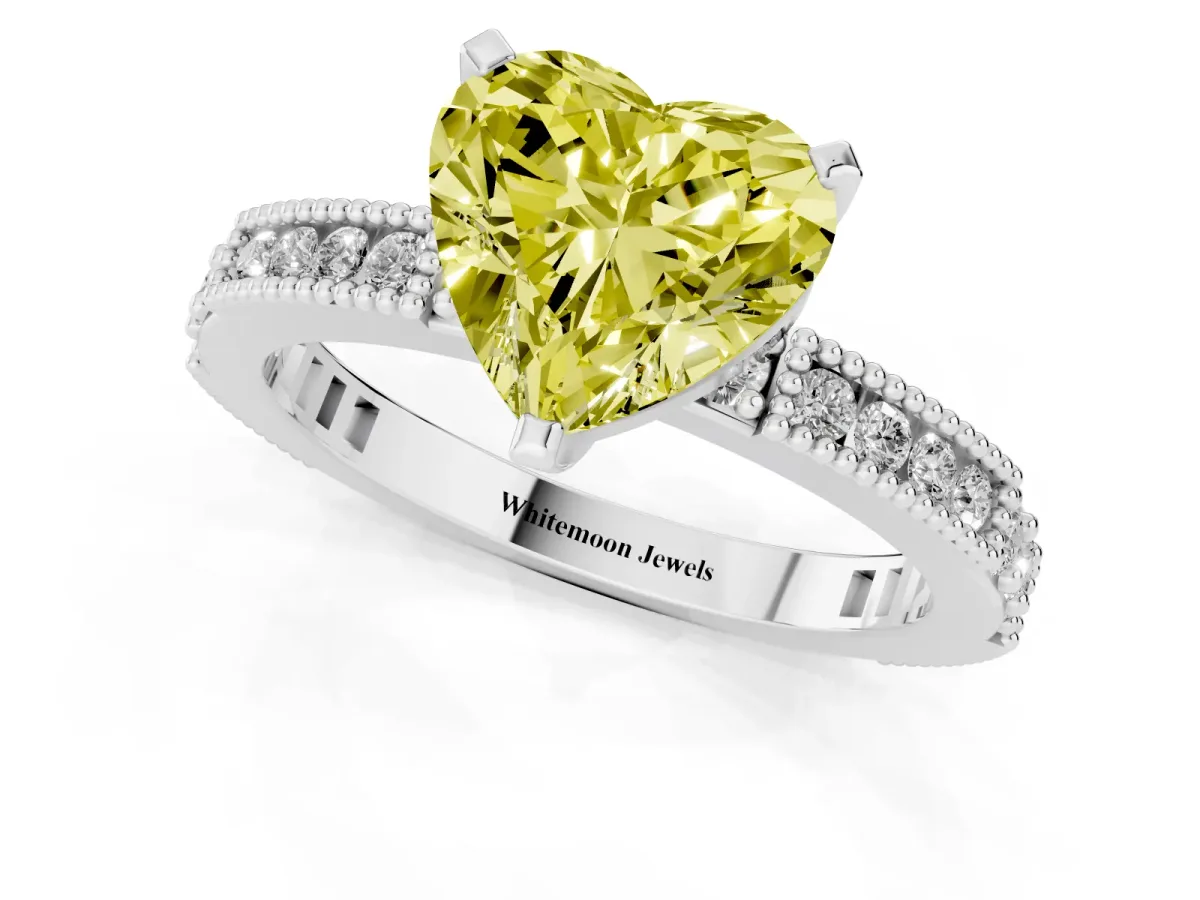 Fancy Yellow Heart Cut Solitaire with Pavé Band and Four-Prong Setting Silver