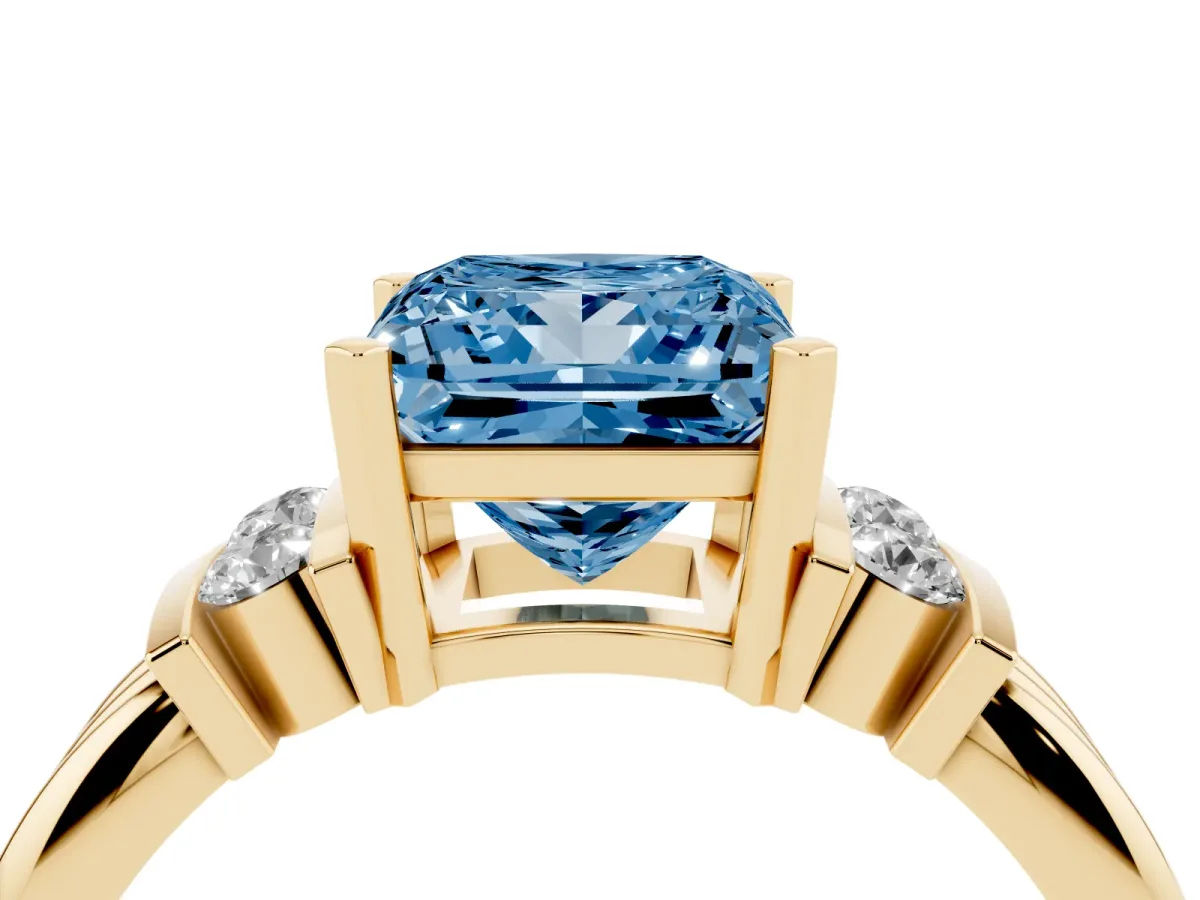 Fancy Blue Princess Cut Cut Three-Stone Channel Set Ring with Bar Prongs Yellow gold