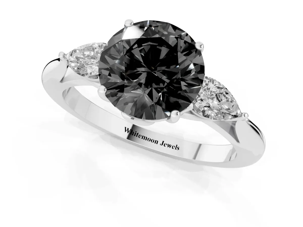 Fancy Black Three-Stone Round Cut Brilliant Diamond Solitaire Ring with Tapered Band and Four-Prong Setting Platinum
