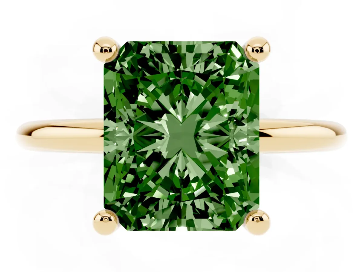 Fancy Green Radiant Cut Solitaire Diamond Ring with 4-Prong Setting on a Classic Band Yellow gold