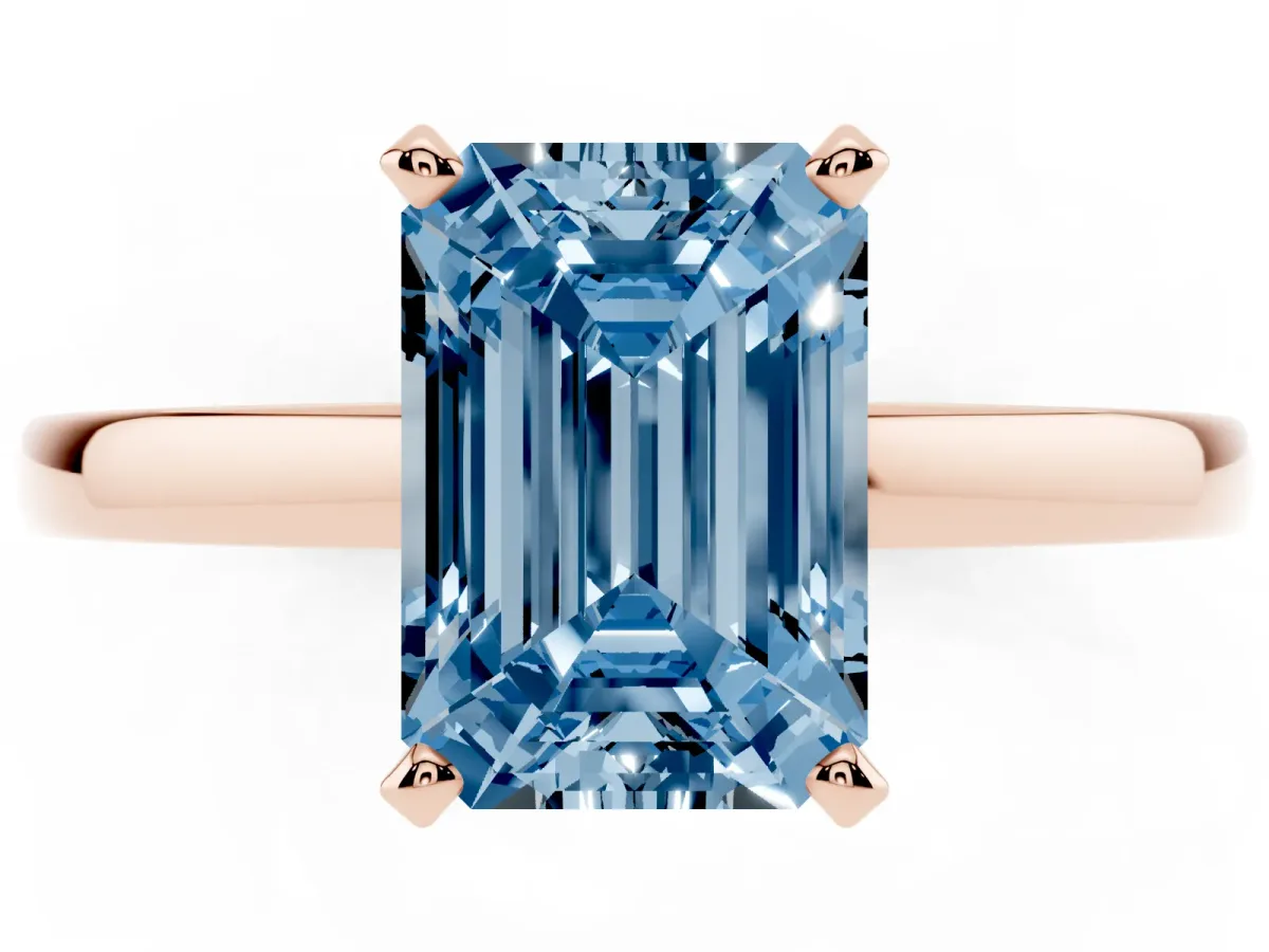 Fancy Blue Emerald Cut Solitaire Diamond Engagement Ring with Four-Prong Setting on a Classic Band Rose gold