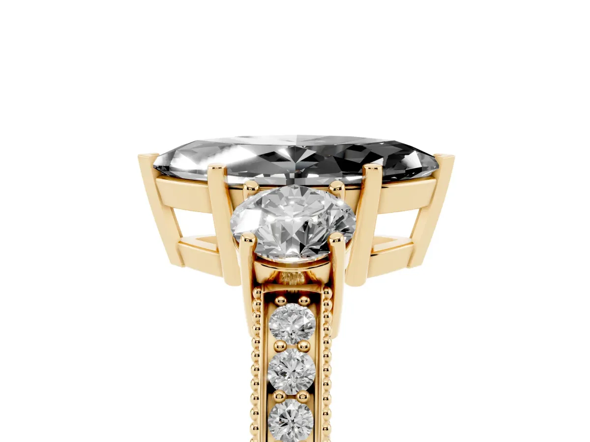 Fancy Black Marquise Cut Three-Stone Diamond Ring with Pavé Band and Four-Prong Setting Yellow gold