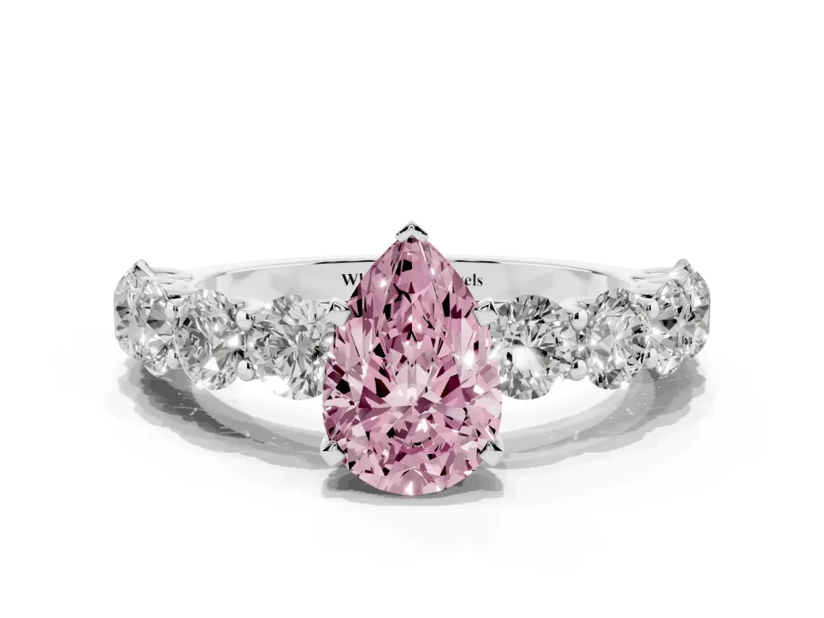 Fancy Pink Pear Cut Diamond Prong Setting with Side Stones on a Pave Band Silver