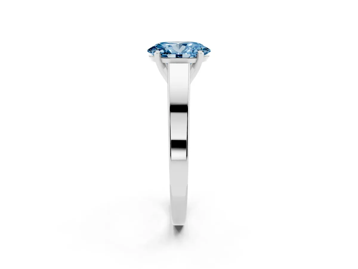 Fancy Blue Oval Cut Solitaire Engagement Ring with Four-Prong Setting and Tapered Band Silver