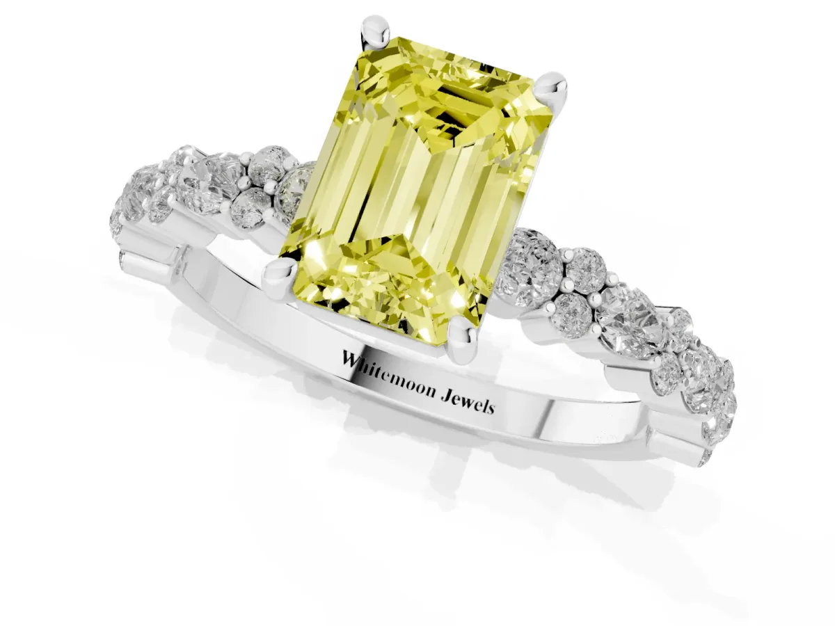 Fancy Yellow Emerald Cut Diamond Side Stone Solitaire Ring with Round and Four-Prong Setting Platinum