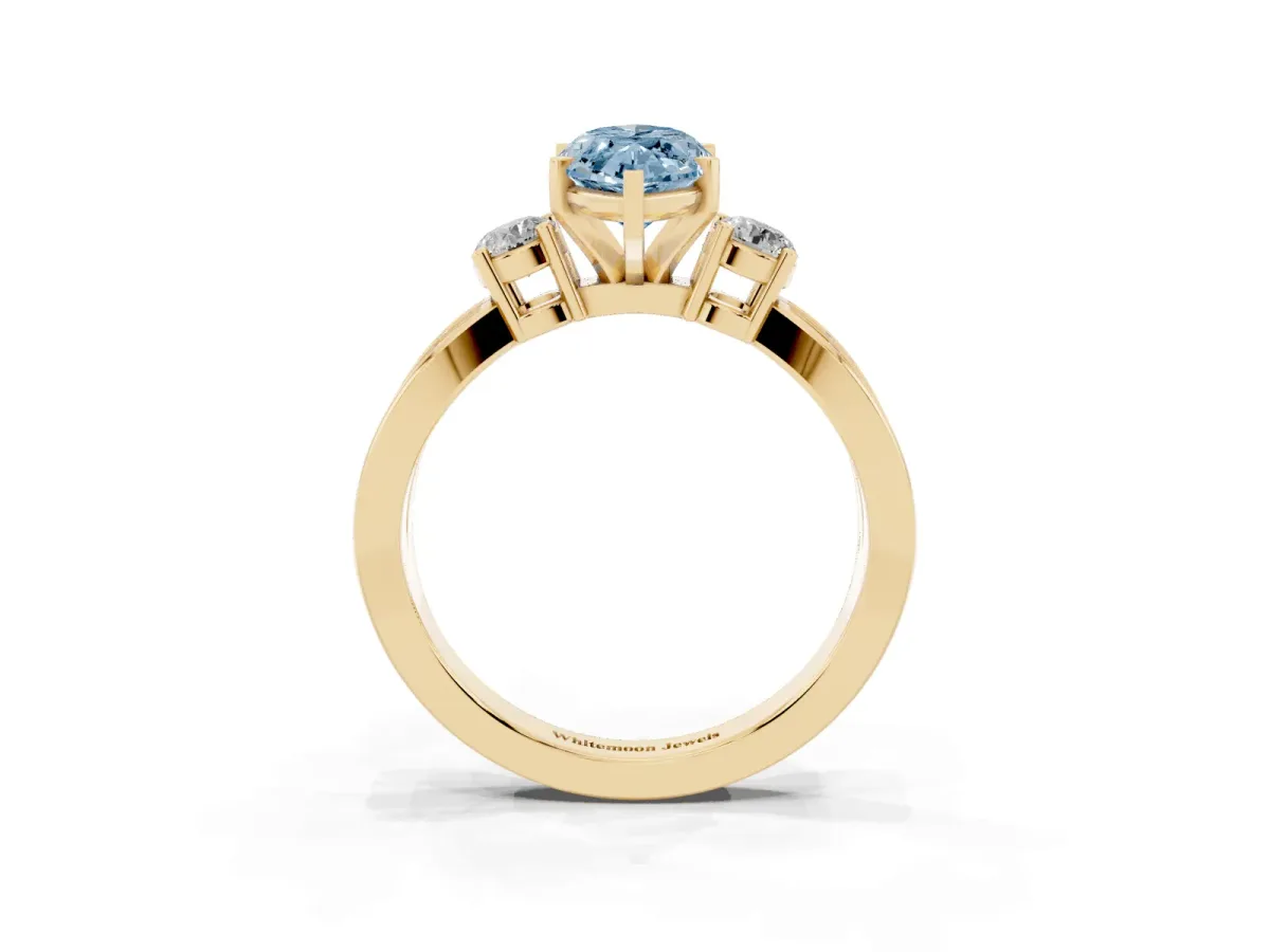 Fancy Blue Three-Stone Marquise Cut Cut Diamond Twist Band with Prong Setting Yellow gold