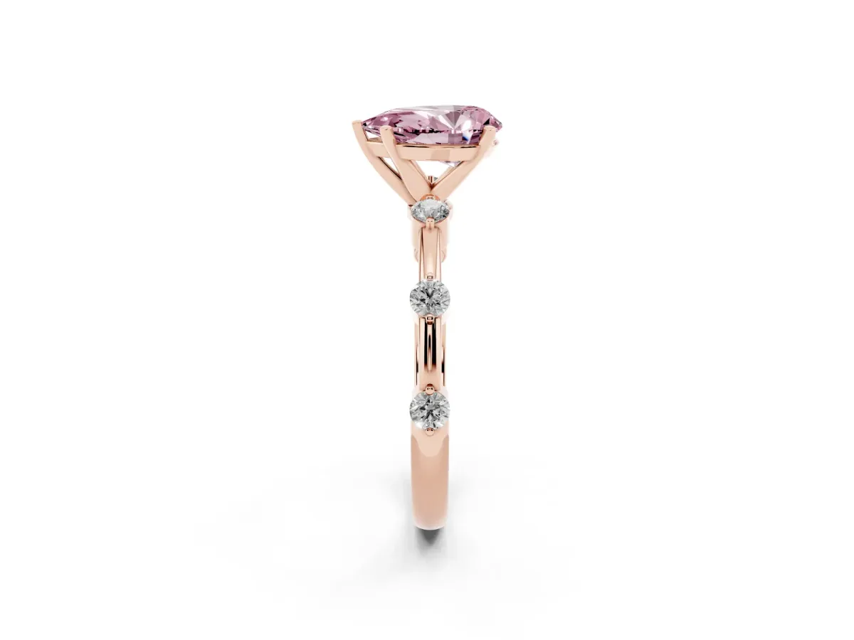 Fancy Pink Pear Cut Solitaire Diamond Ring with Bezel Set Side Stones and Prong Setting Rose gold