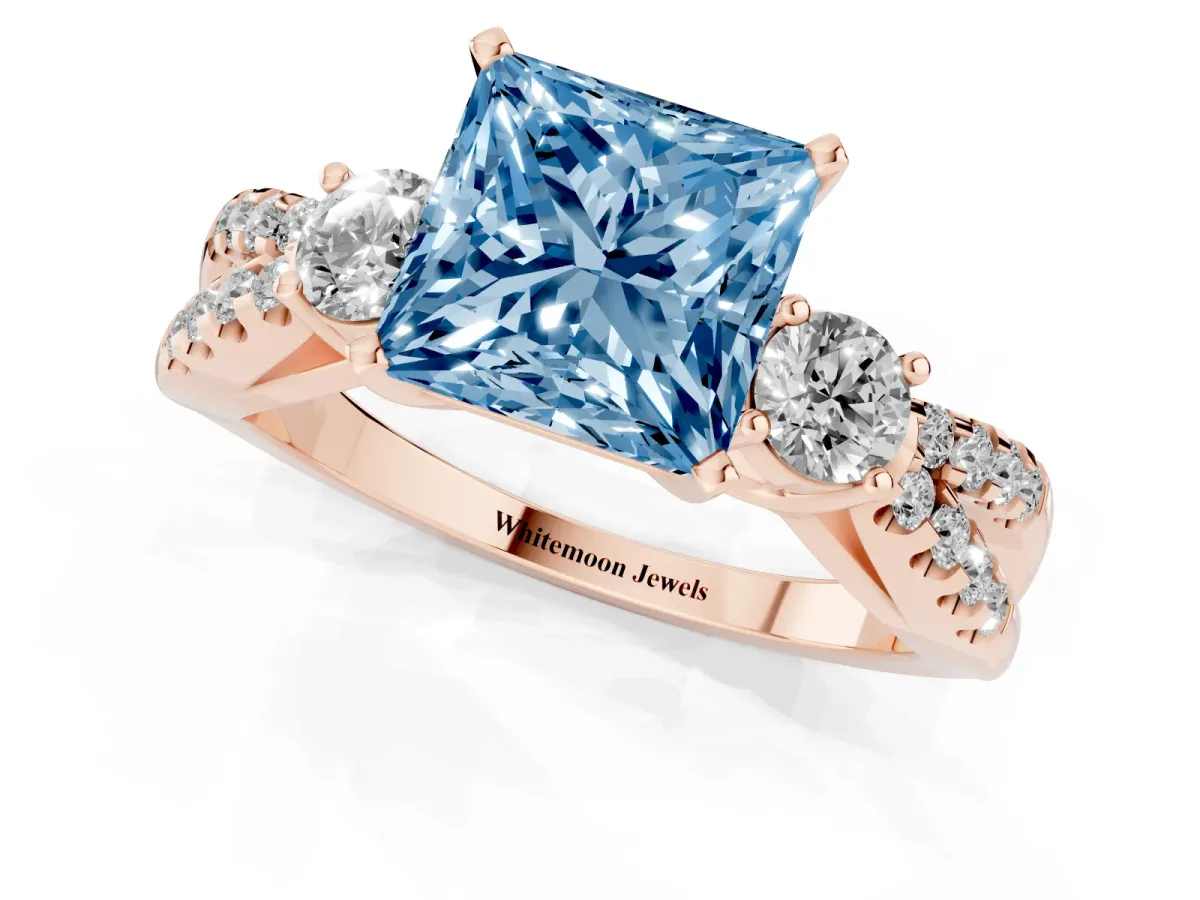 Fancy Blue Princess Cut Diamond Three-Stone Ring with Pavé Split Shank and Four-Prong Setting Rose gold