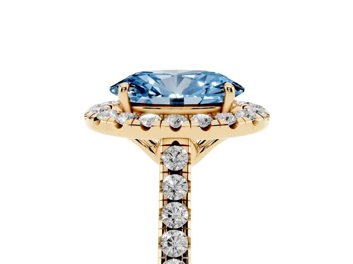 Fancy Blue Oval Cut Halo Pavé Diamond Engagement Ring with Four-Prong Setting Yellow gold