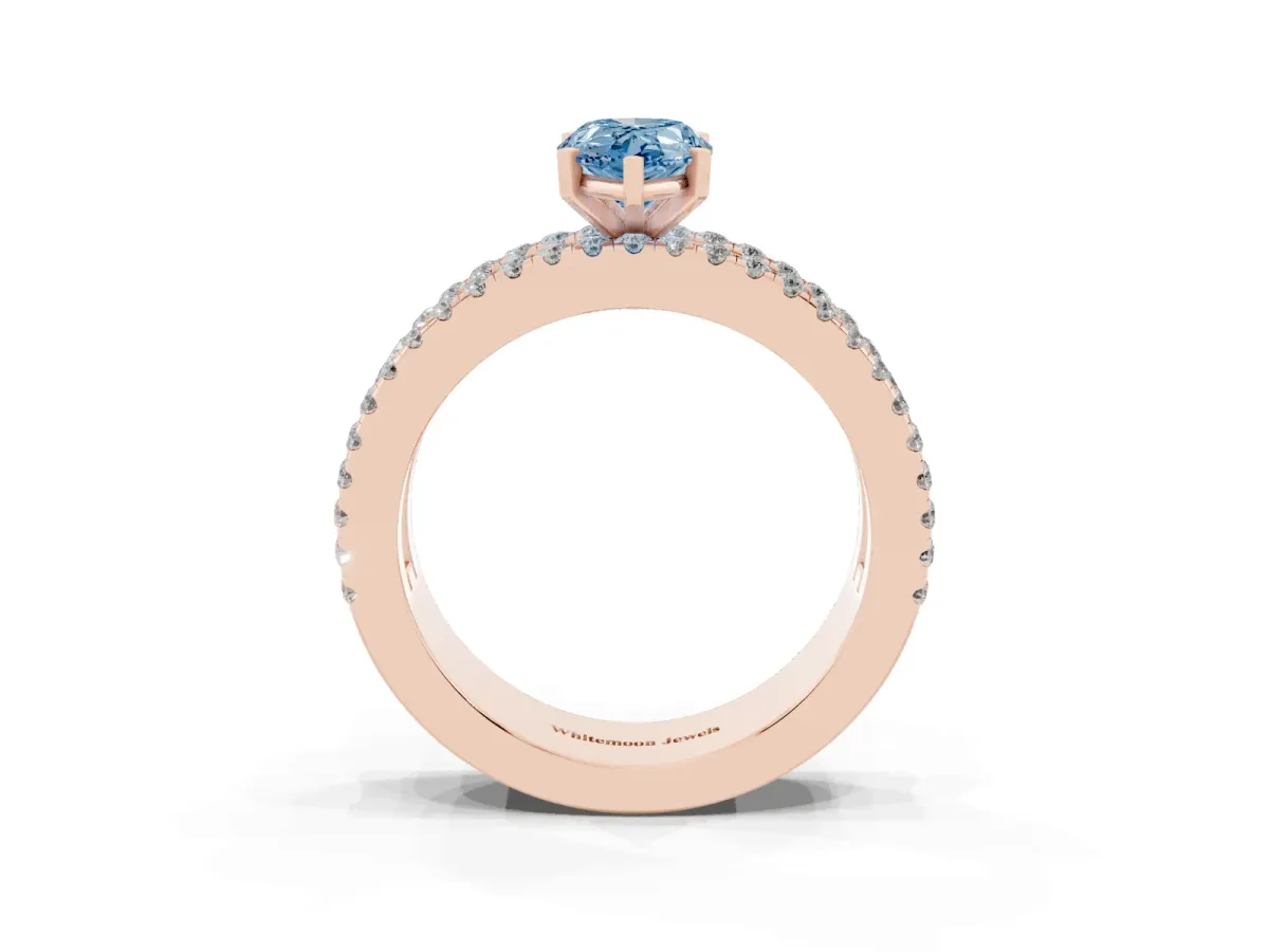 Fancy Blue Pear Cut Diamond Solitaire Ring with Pavé and Channel Set Band Rose gold
