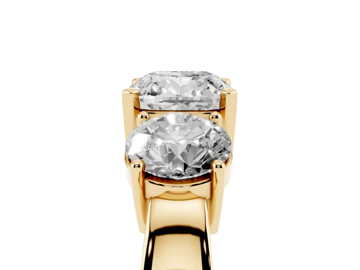 Three-Stone Cushion Cut Diamond Ring with Round Side Stones, Classic Band, and Four-Prong Setting Yellow gold