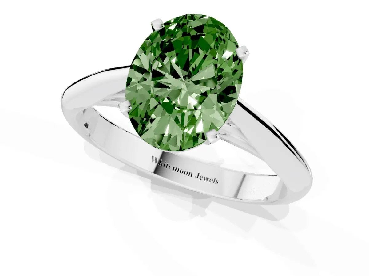 Fancy Green Oval Cut Diamond Solitaire Engagement Ring with Cathedral Setting and Four-Prong Mount Platinum