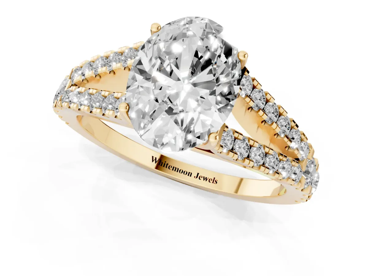 Oval Cut Diamond Split Shank Pavé Engagement Ring with Four-Prong Setting Yellow gold