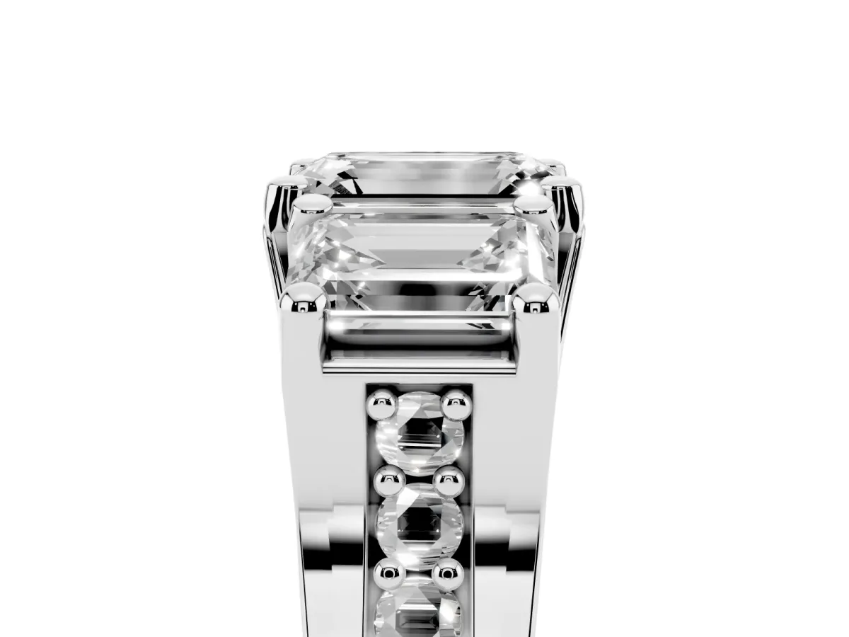 Emerald Cut Diamond Three-Stone Ring with Channel Set Band and Four-Prong Setting Silver