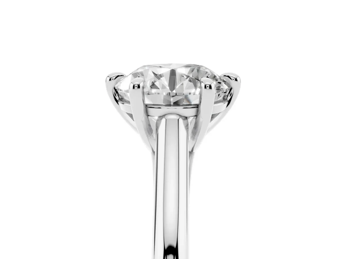 Round Cut Solitaire Engagement Ring with Six-Prong Setting and Classic Band Silver