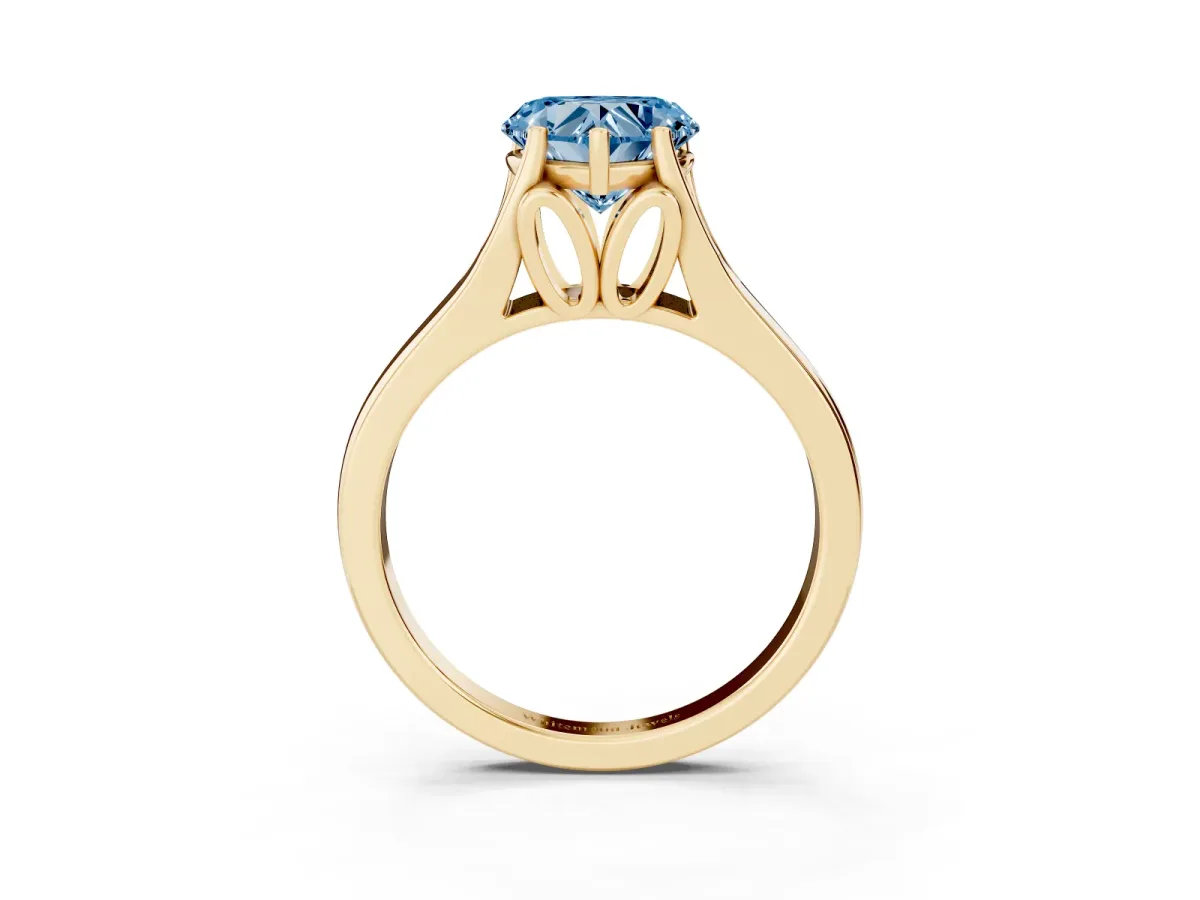 Fancy Blue Heart Cut Solitaire Diamond Ring with Cathedral Band and Four-Prong Setting Yellow gold