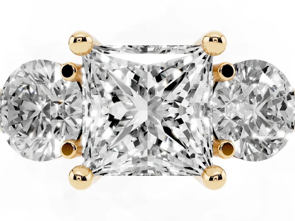 Three-Stone Princess Cut Brilliant Cut Solitaire Ring with Prong Setting on a Classic Band Yellow gold