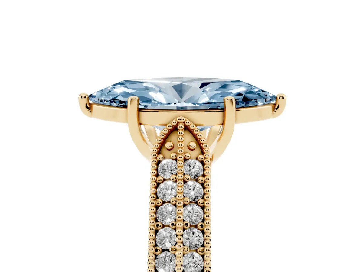 Fancy Blue Marquise Cut Cut Pave Split Shank Engagement Ring with Four-Prong Setting Yellow gold