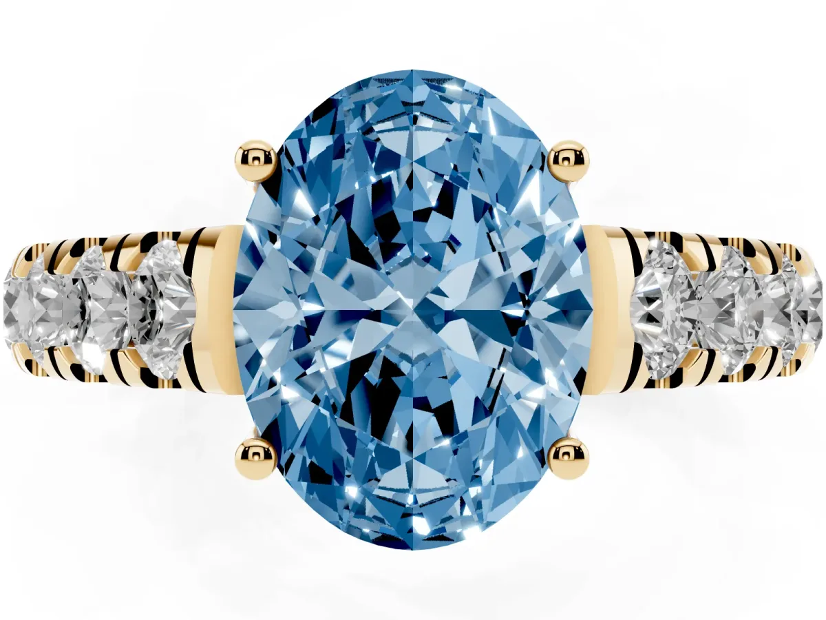 Fancy Blue Oval Cut Cut Diamond Solitaire Ring with Micro Pave Band and Prong Setting Yellow gold
