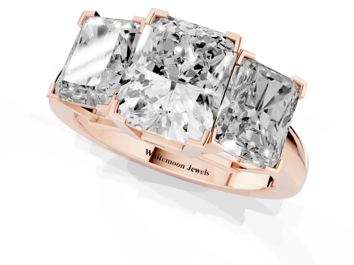 Three-Stone Radiant Cut Cut Diamond Ring with Channel Set Band and Four-Prong Setting Rose gold