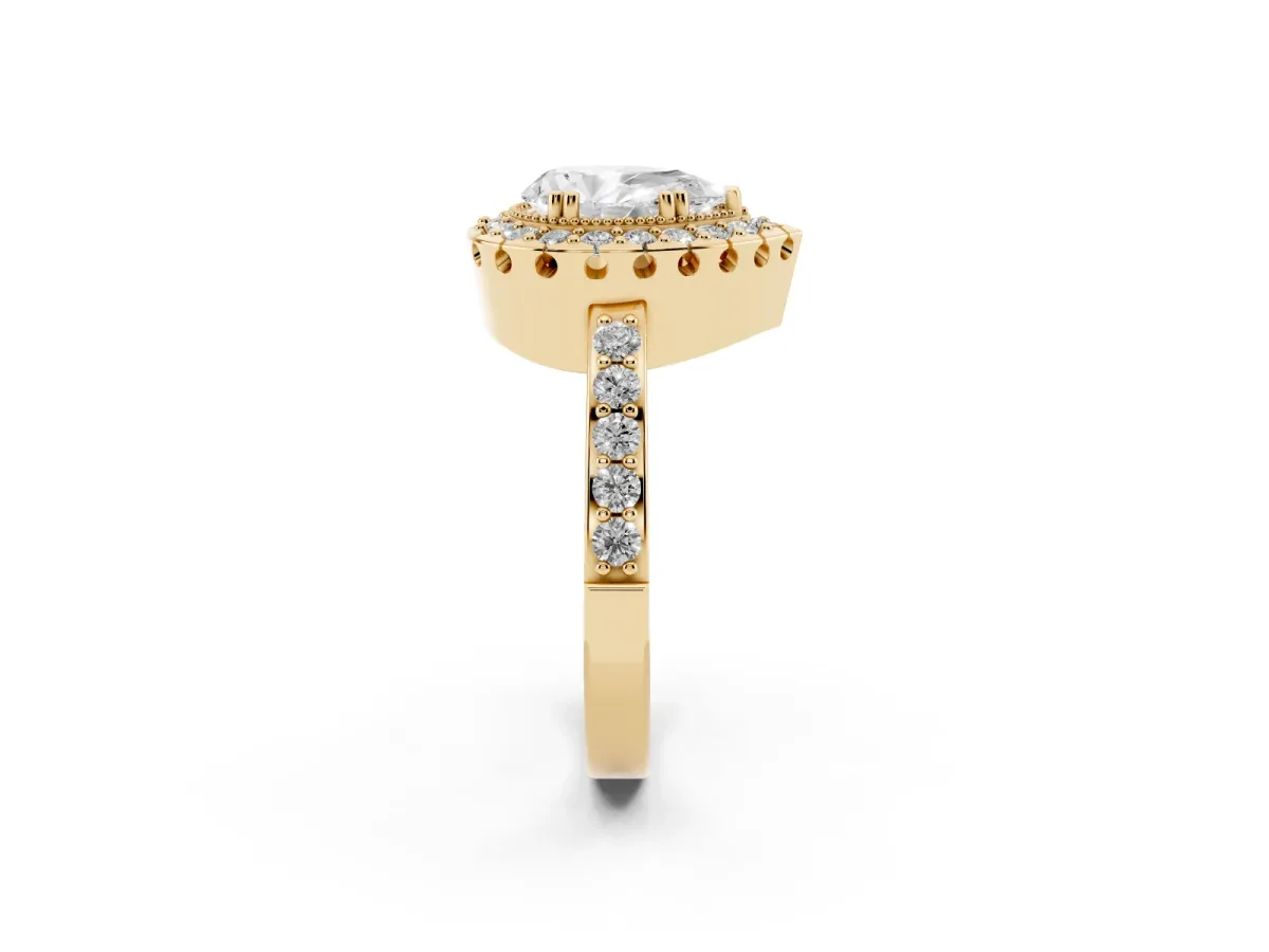 Pear Cut Diamond Halo Ring with Pavé Band and Prong Setting Yellow gold