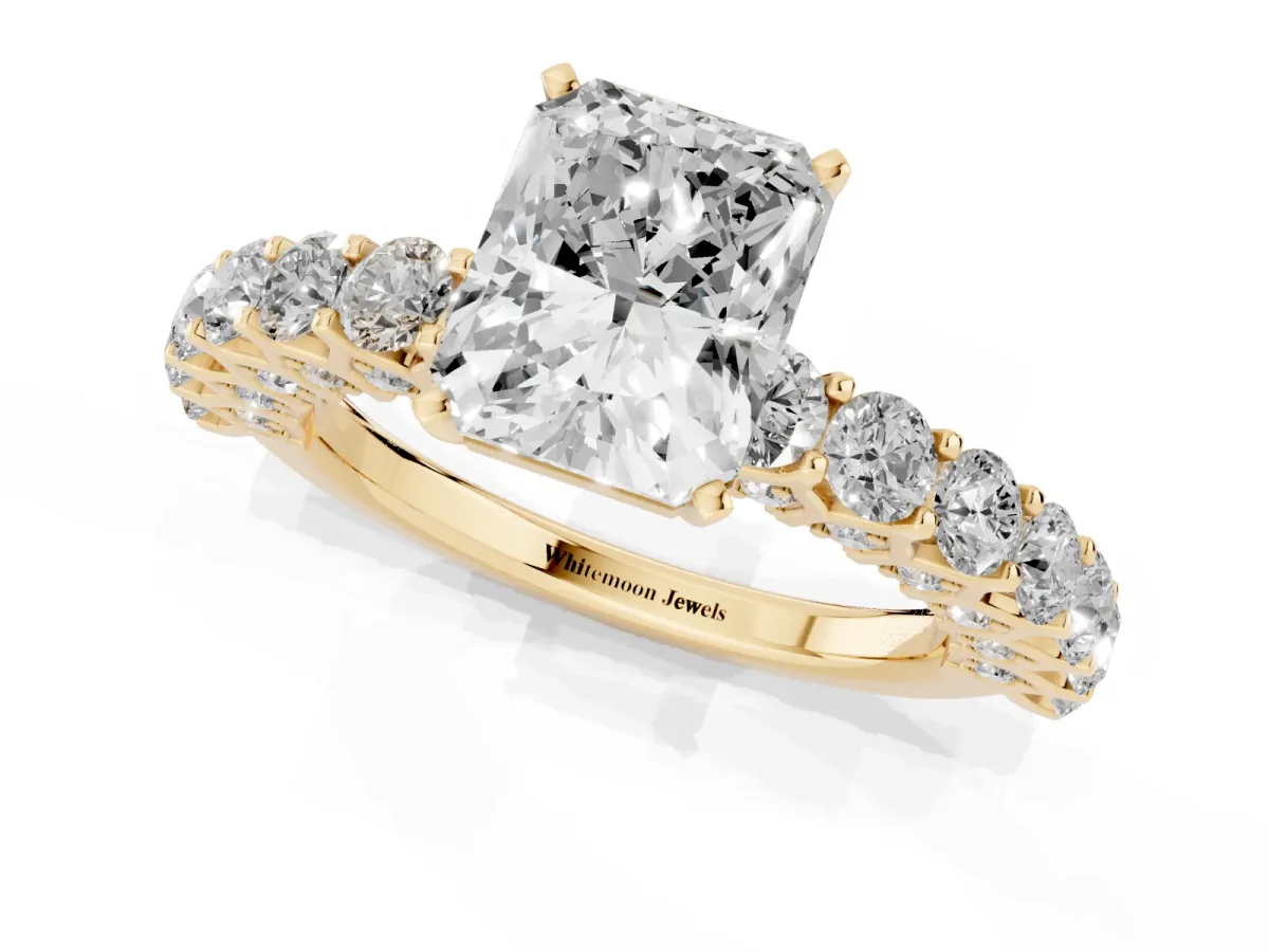 Radiant Cut Diamond Solitaire Ring with Shared Prong Pavé Band and Four-Prong Setting Yellow gold