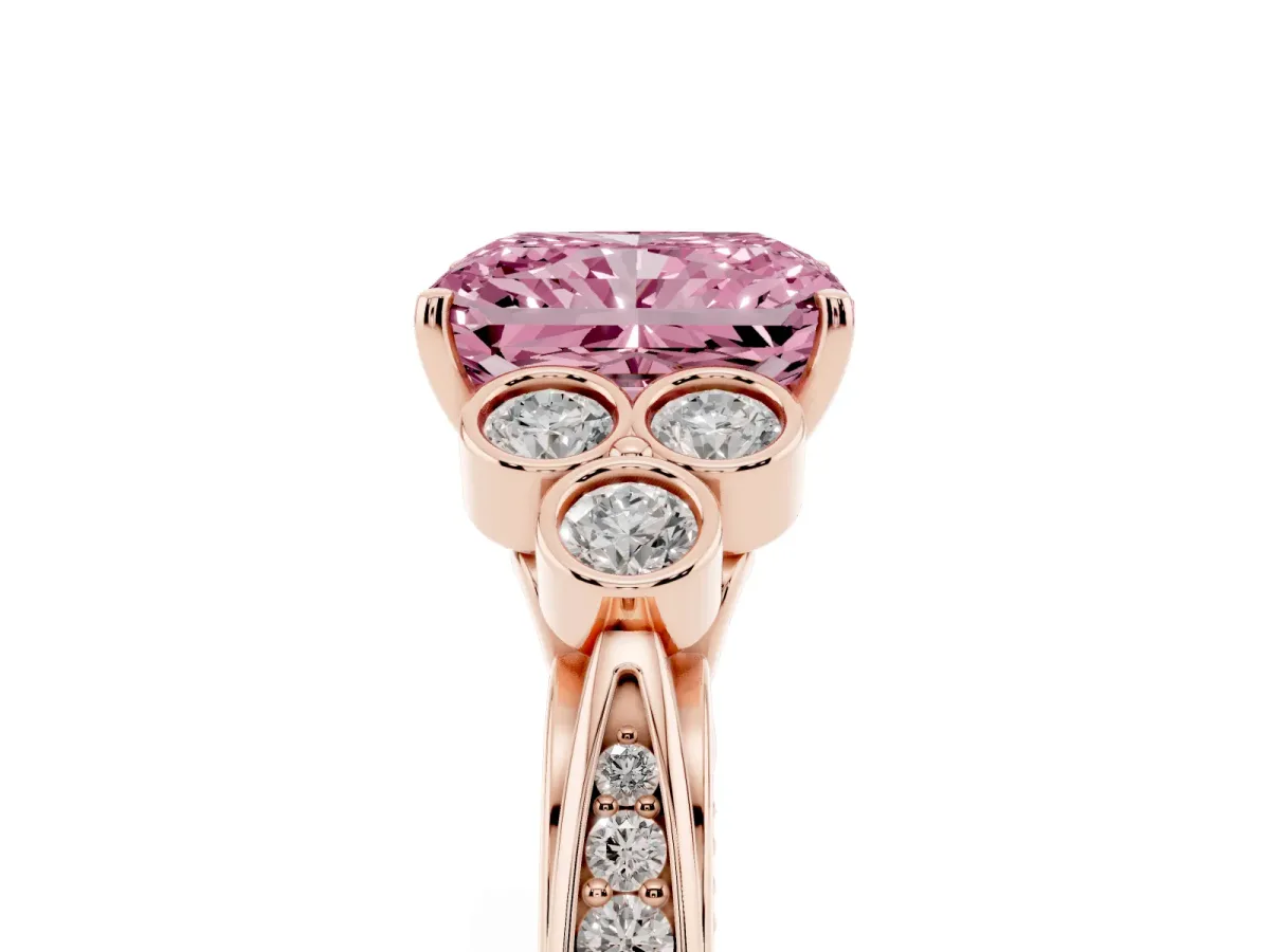 Fancy Pink Radiant Cut Cut Diamond Engagement Ring with Bezel Set Round Side Stones and Prong Setting Rose gold