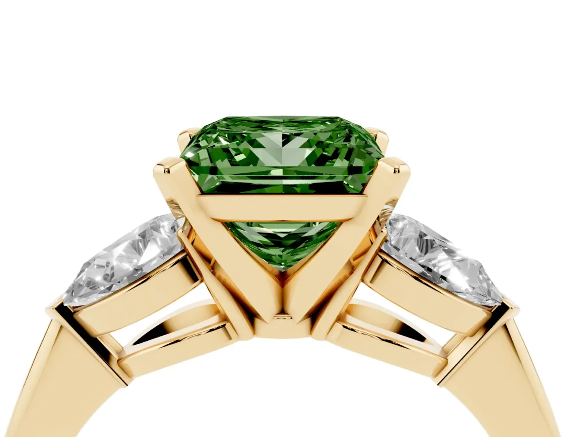 Fancy Green Three-Stone Princess Cut Diamond Ring with Pear Side Stones and Four-Prong Setting Yellow gold
