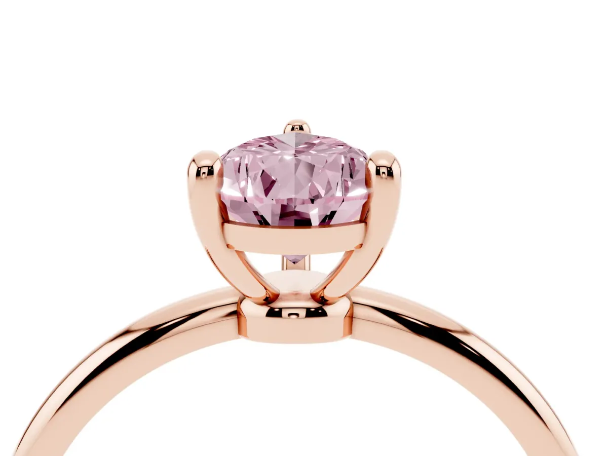 Fancy Pink Pear Cut Solitaire Diamond Ring with 4-Prong Setting on a Classic Band Rose gold