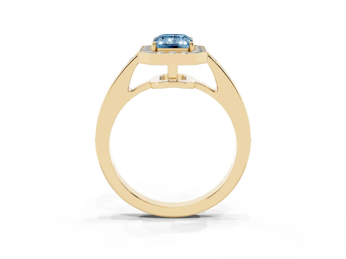 Fancy Blue Emerald Cut Halo Pavé Diamond Engagement Ring with Bezel Setting Yellow gold