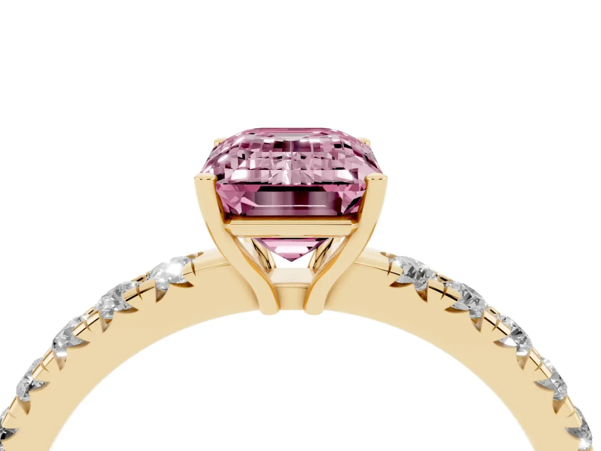 Fancy Pink Emerald Cut Diamond Pavé Solitaire Engagement Ring with Four-Prong Setting Yellow gold
