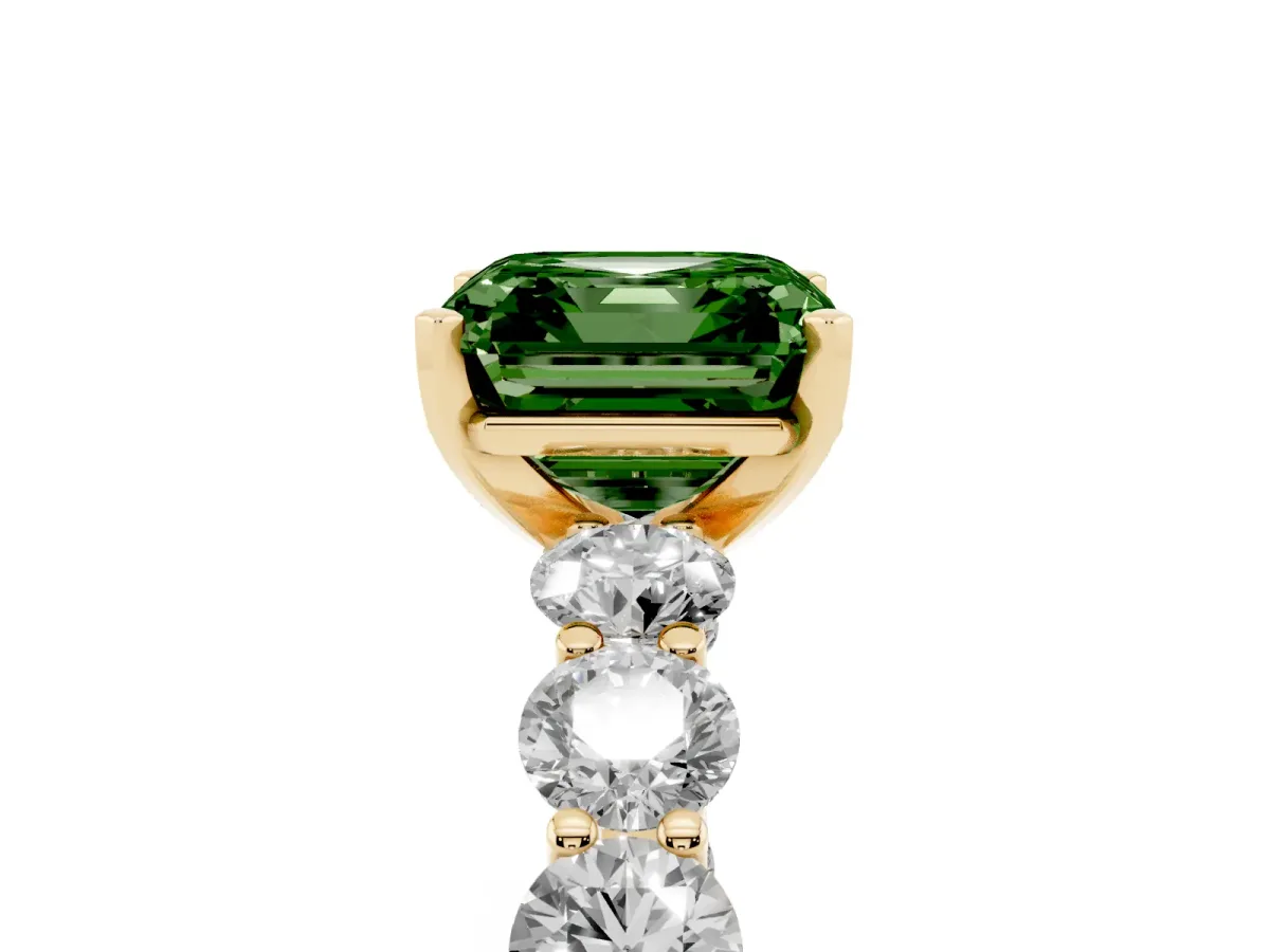 Fancy Green Asscher Cut Diamond Prong Setting with Side Stones on a Pave Band Yellow gold