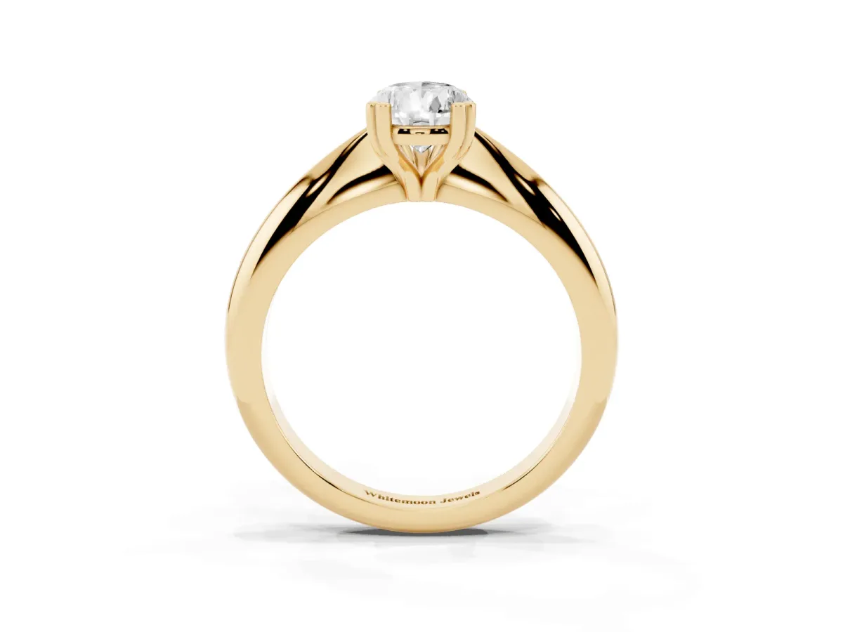 Pear Cut Cut Solitaire Engagement Ring with Tapered Band and Four-Prong Setting Yellow gold