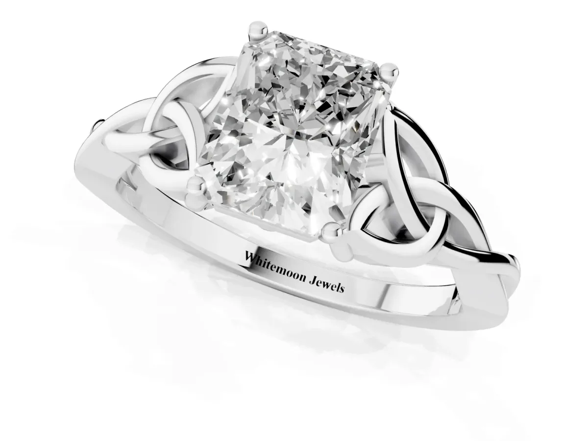 Radiant Cut Diamond Solitaire Engagement Ring with Celtic Knot Band and Four-Prong Setting Silver