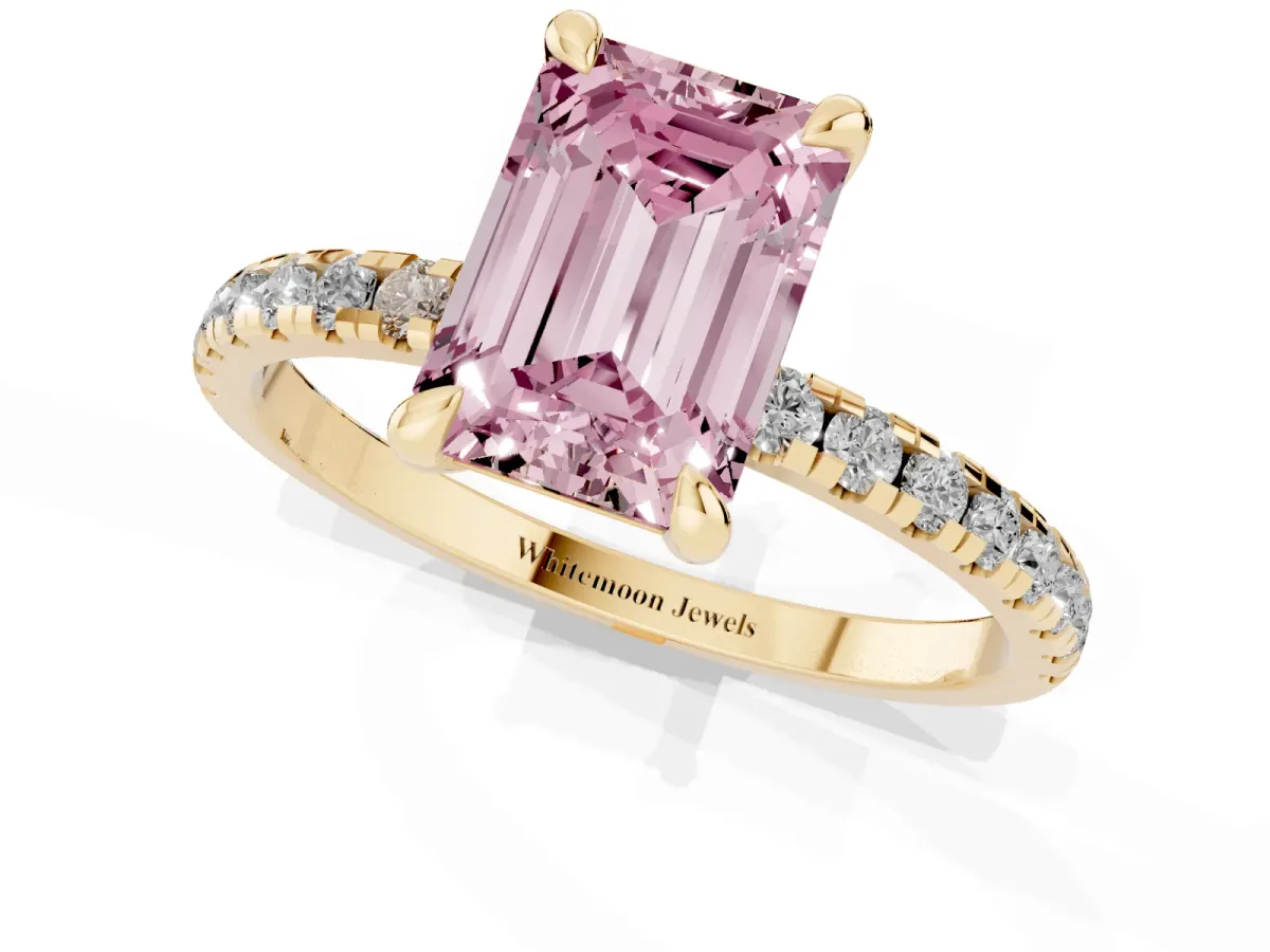 Fancy Pink Emerald Cut Diamond Brilliant Solitaire Ring with Pavé Band and Four-Prong Setting Yellow gold