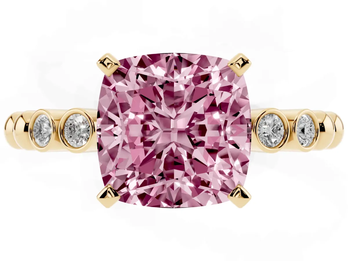 Fancy Pink Cushion Cut Solitaire Bezel Accent Diamond Engagement Ring with Beaded Band and Four-Prong Setting Yellow gold
